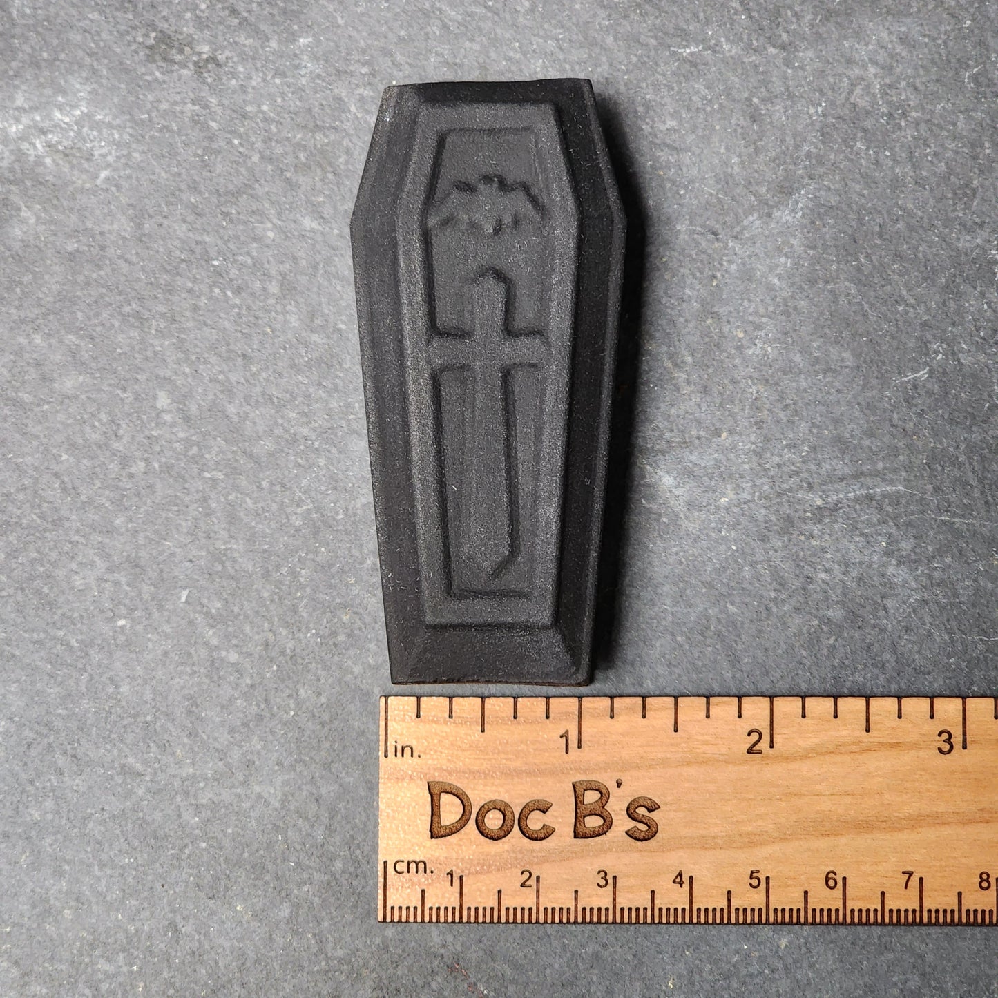 Matte Black Obsidian Coffin Carving