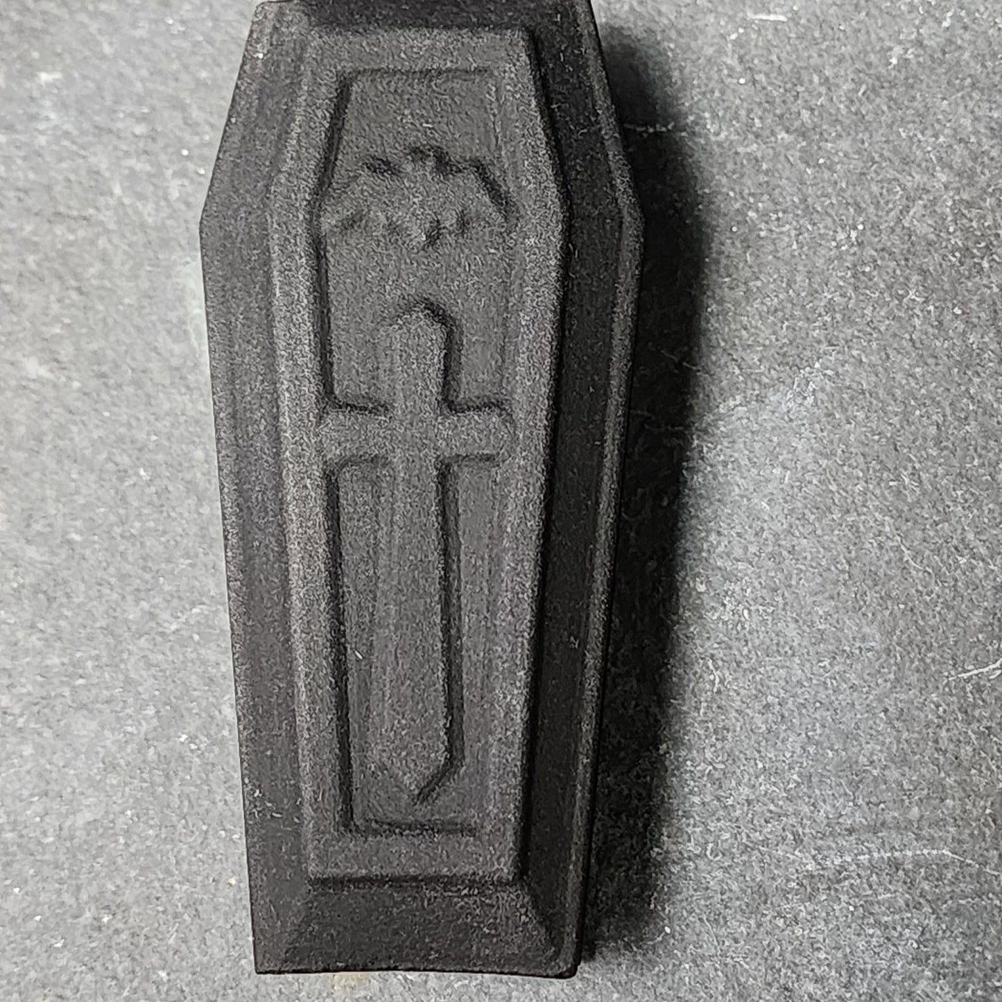 Matte Black Obsidian Coffin Carving