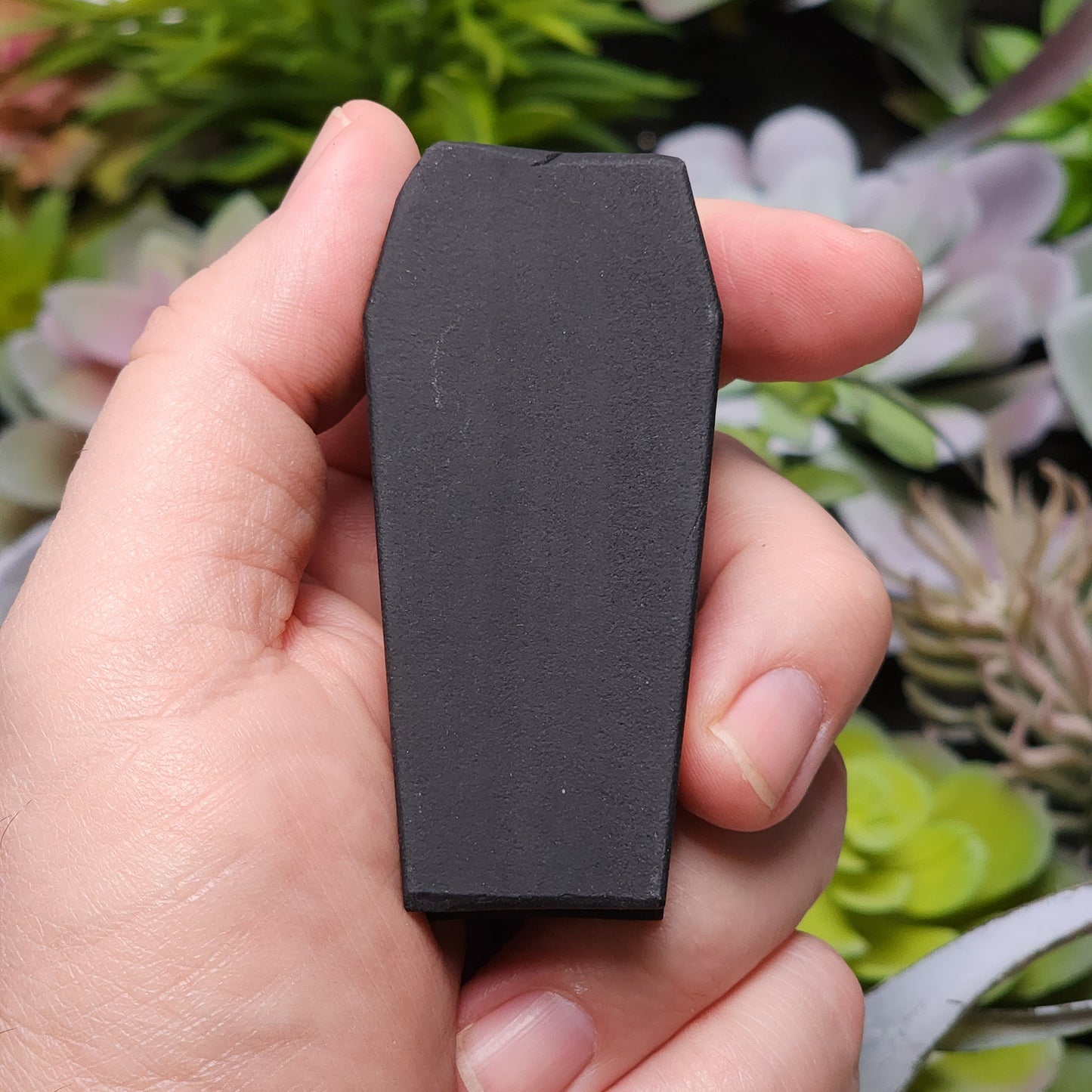 Matte Black Obsidian Coffin Carving