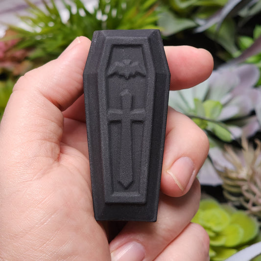 Matte Black Obsidian Coffin Carving